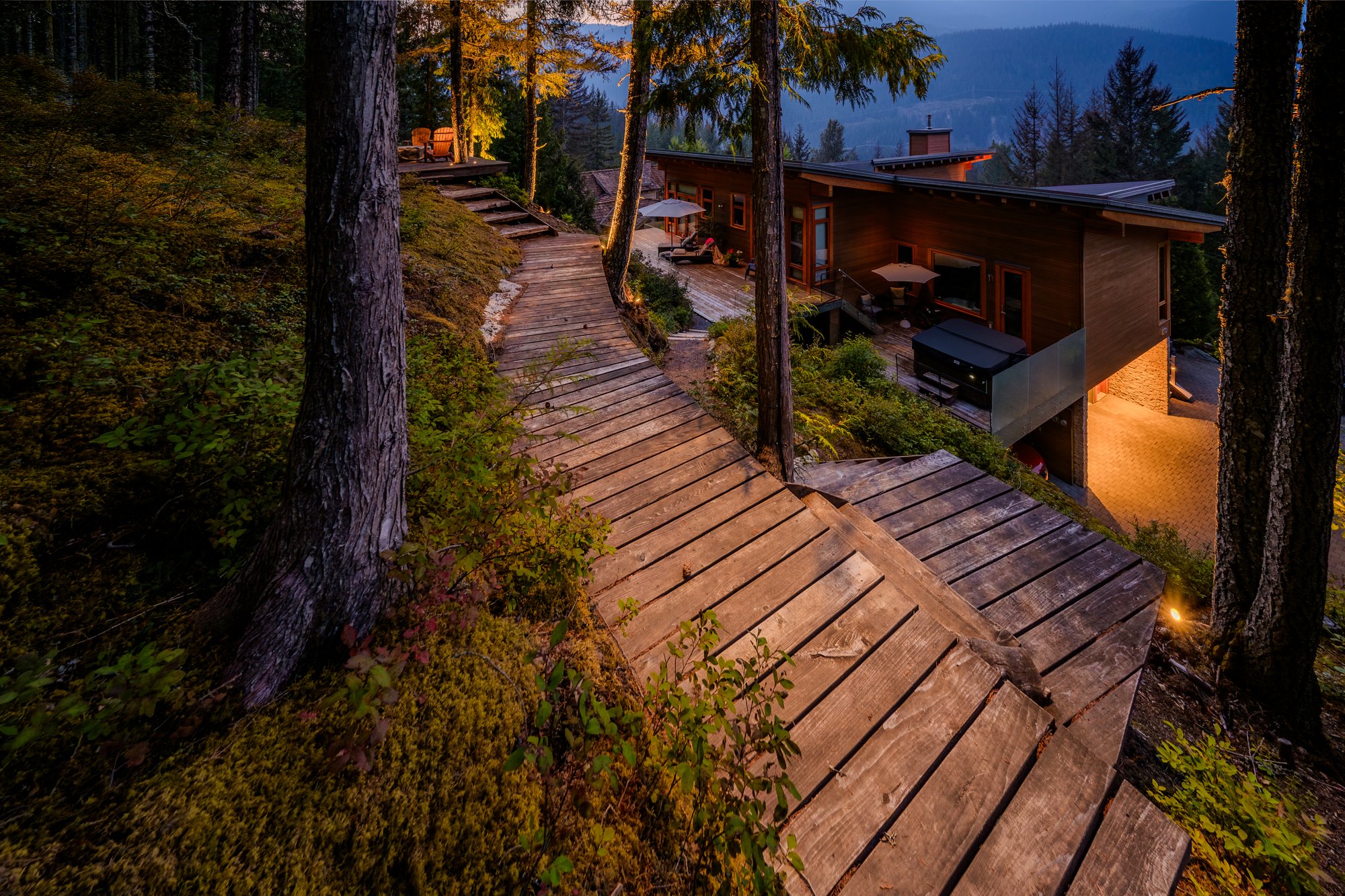 Whistler Landscape Lighting for a Mountainside Home - A Forest Boardwalk Illuminated Without Path Lights
