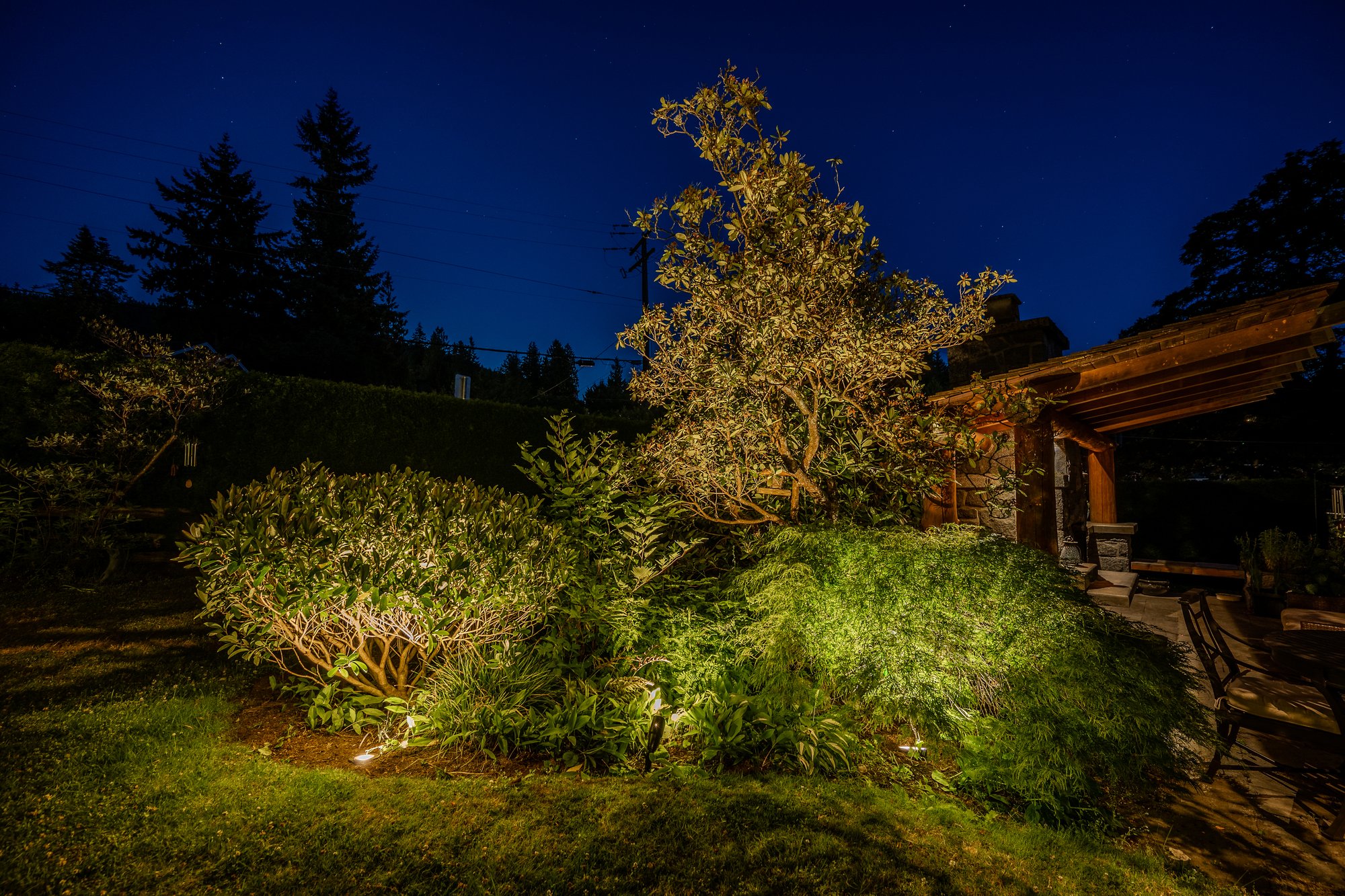 Outdoor living spaces enhanced with professionally installed low voltage deck and patio lighting